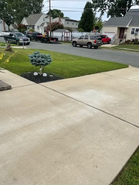 Local outdoor landscaping with custom design in Woodbury, NJ by Warner's Lawn Care