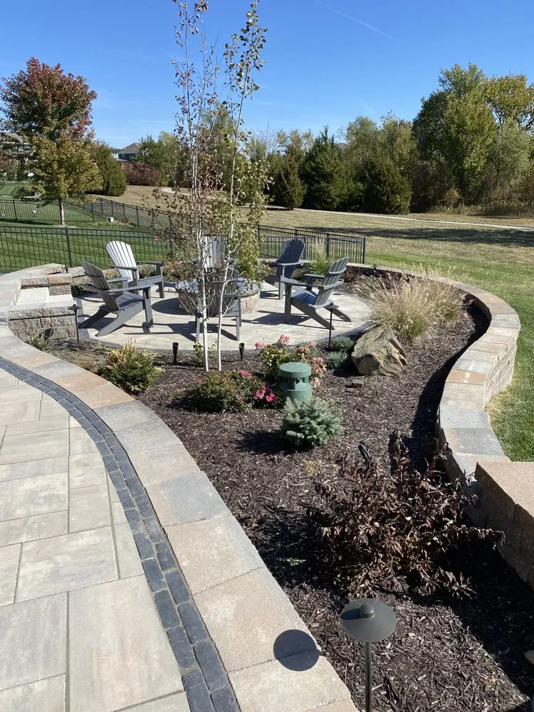 Custom yard cleanup service for residential properties in Olathe, KS by Warrior Outdoors