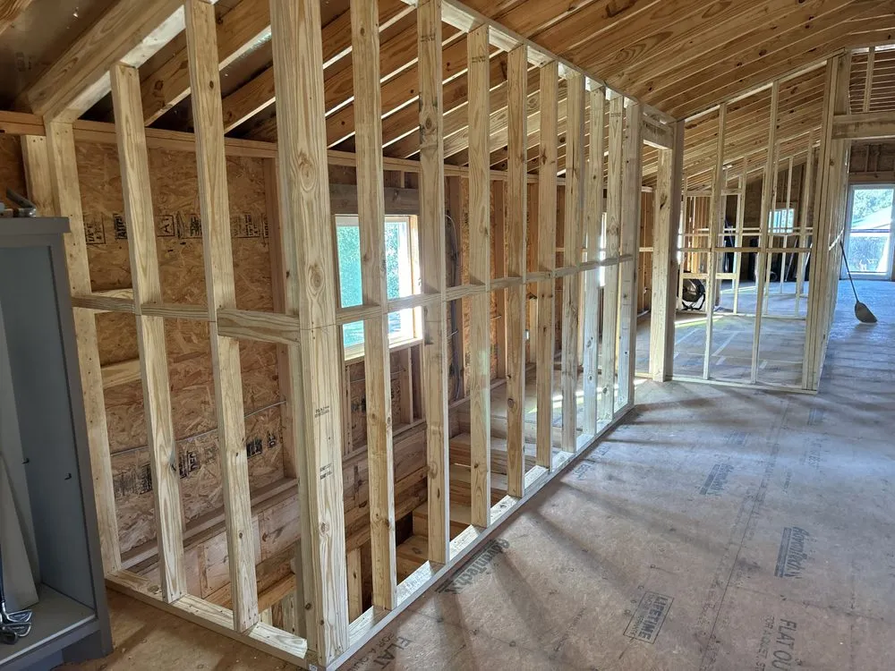 Custom residential landscaping in Needville, TX by Warrior siding