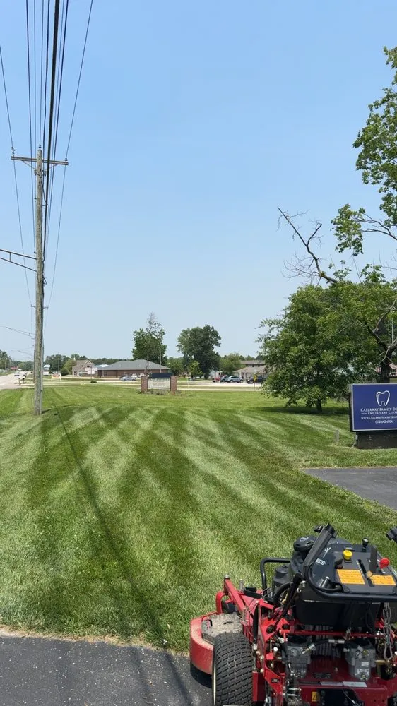 Custom lawn mowing service for residential properties in Ashland, MO by Wassmann Lawn and Land