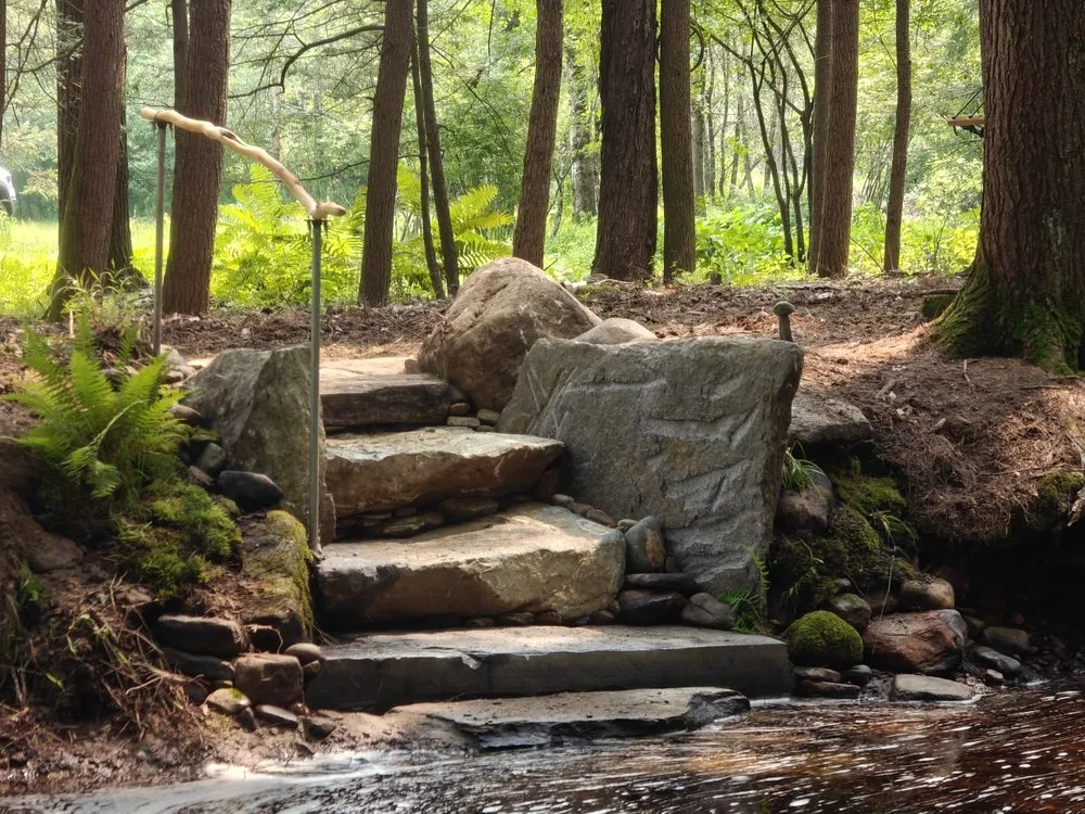 Professional lawn mowing service for residential properties across Leverett, MA - Water Earth & Flowers