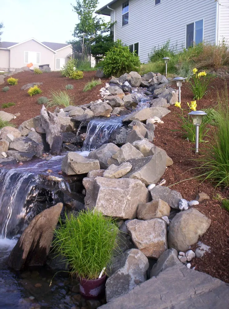 Custom landscape design with custom design in Rathdrum, ID by Waterfalls Northwest