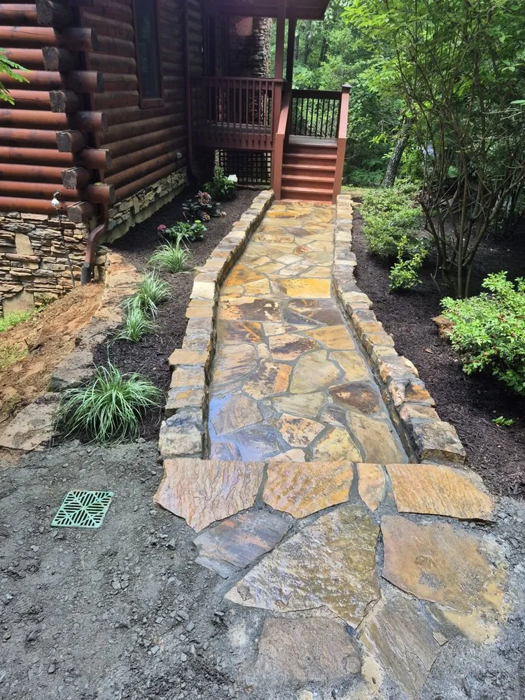 Custom lawn mowing service for residential properties across Franklin, NC - Waterfalls Painting And Landscaping