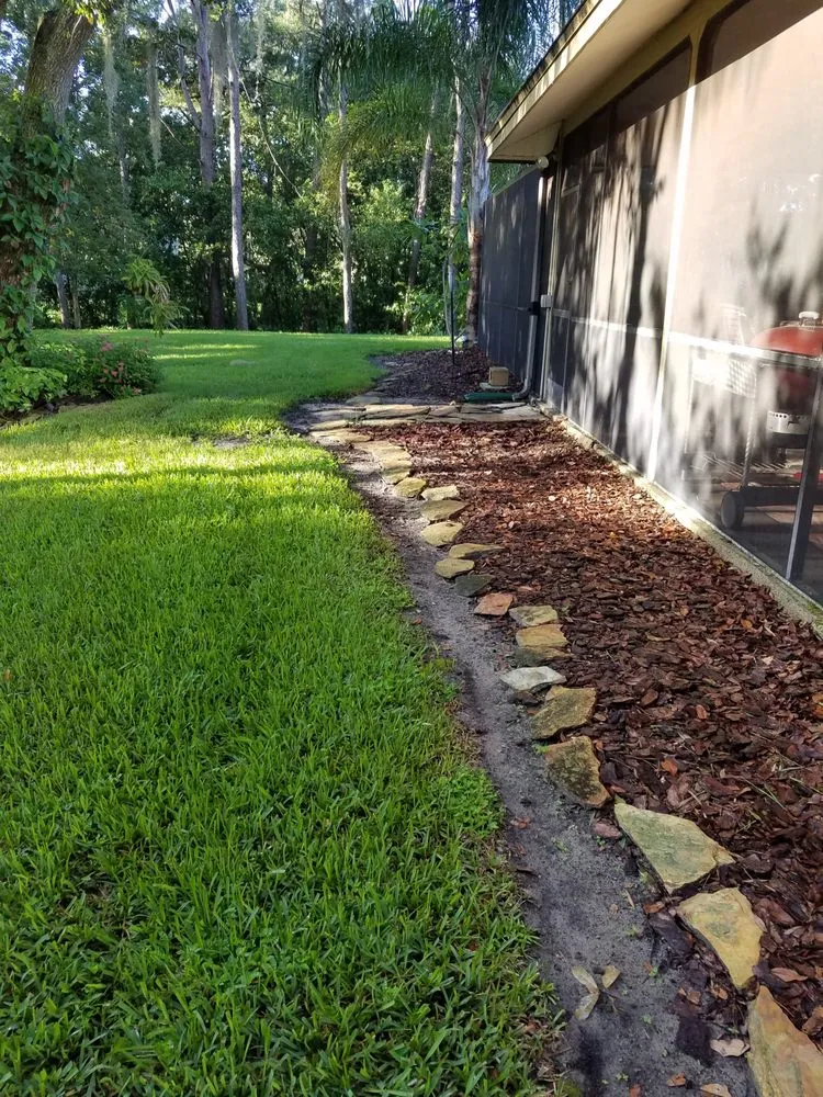 Local yard cleanup service for year-round maintenance in Tampa, FL by Watergrass Property Maintenance