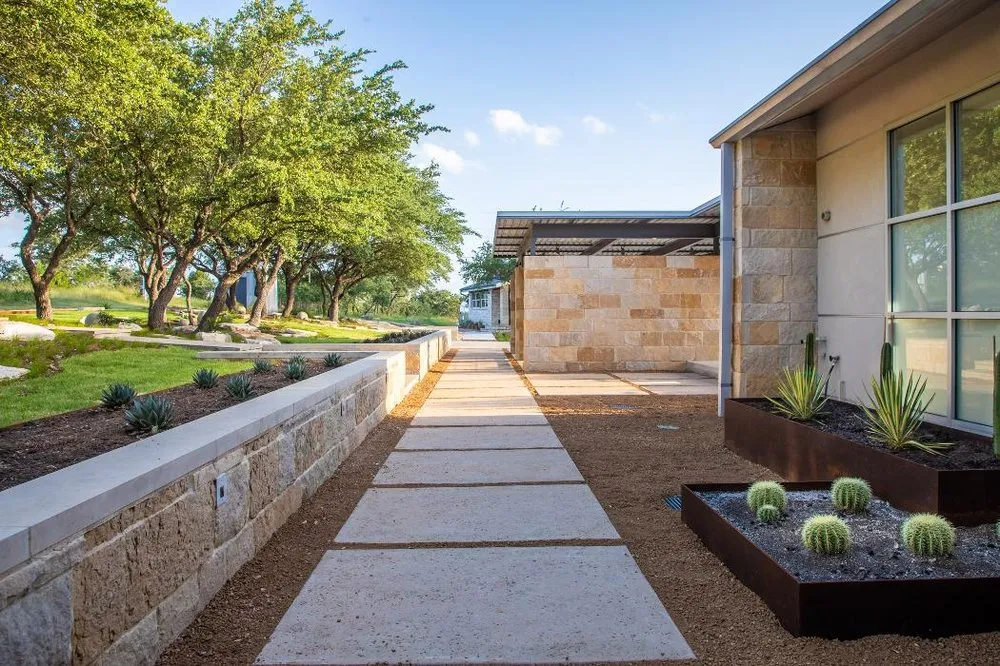 Affordable lawn mowing service for year-round maintenance in Austin, TX by Waterloo Outdoor Design Build