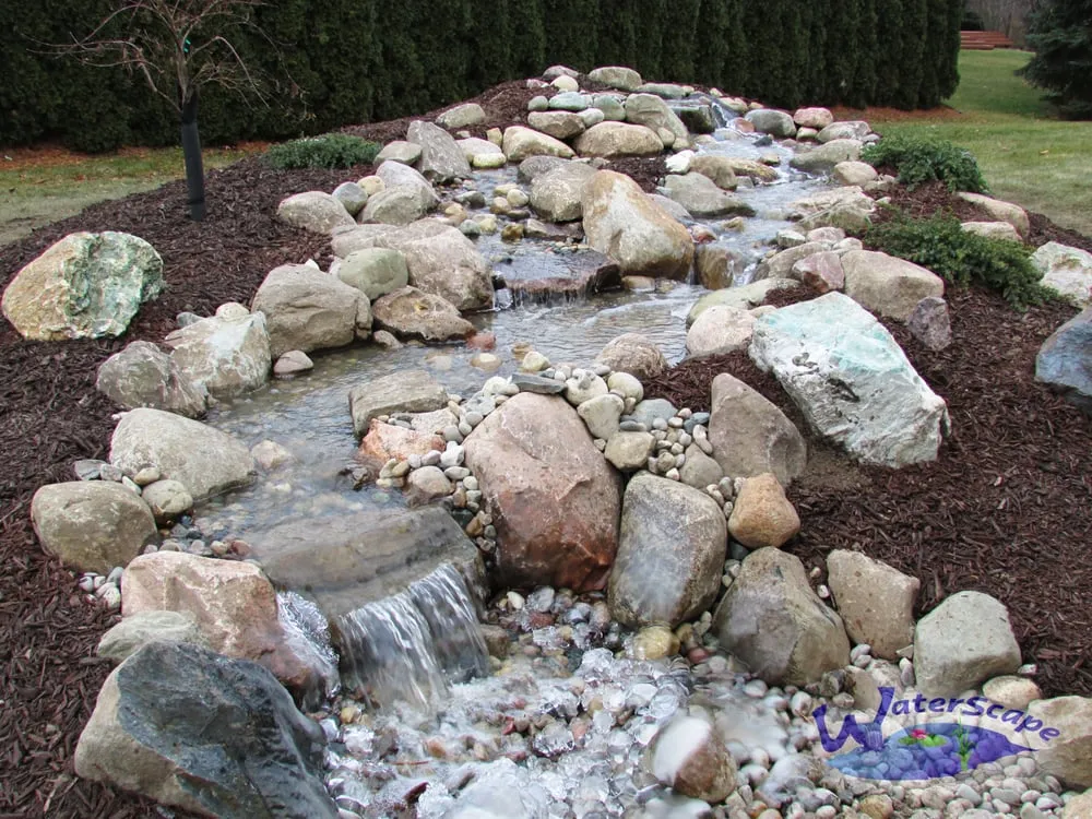 Custom lawn mowing service for year-round maintenance in South Lyon, MI by WaterScape