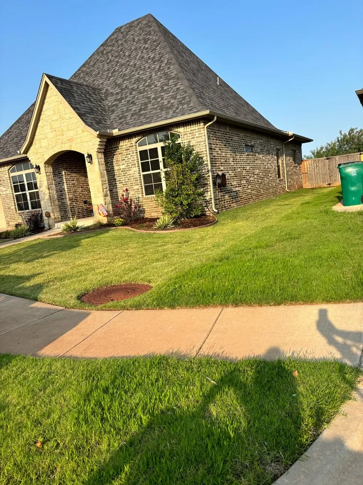 Custom landscape design with custom design in Tuttle, OK by Watson All Around