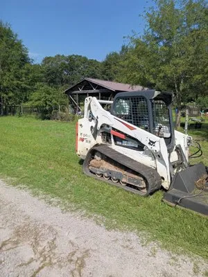 Watts Clearing And Grading Logo