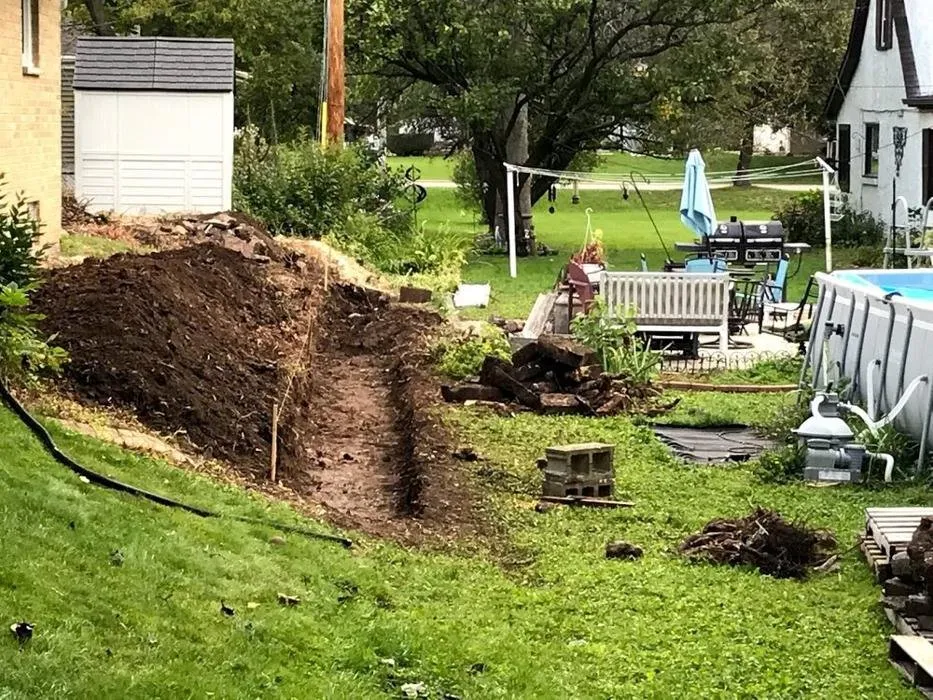 Expert yard cleanup service in Menomonee Falls, WI by WayBetter Landscaping & Snowplowing