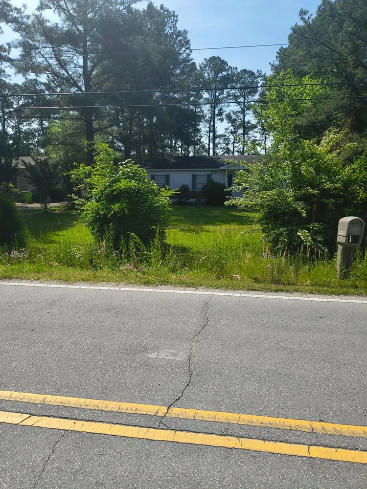 Top-rated garden landscaping near you in New Bern, NC by We Keep It Pushing Lawn Care