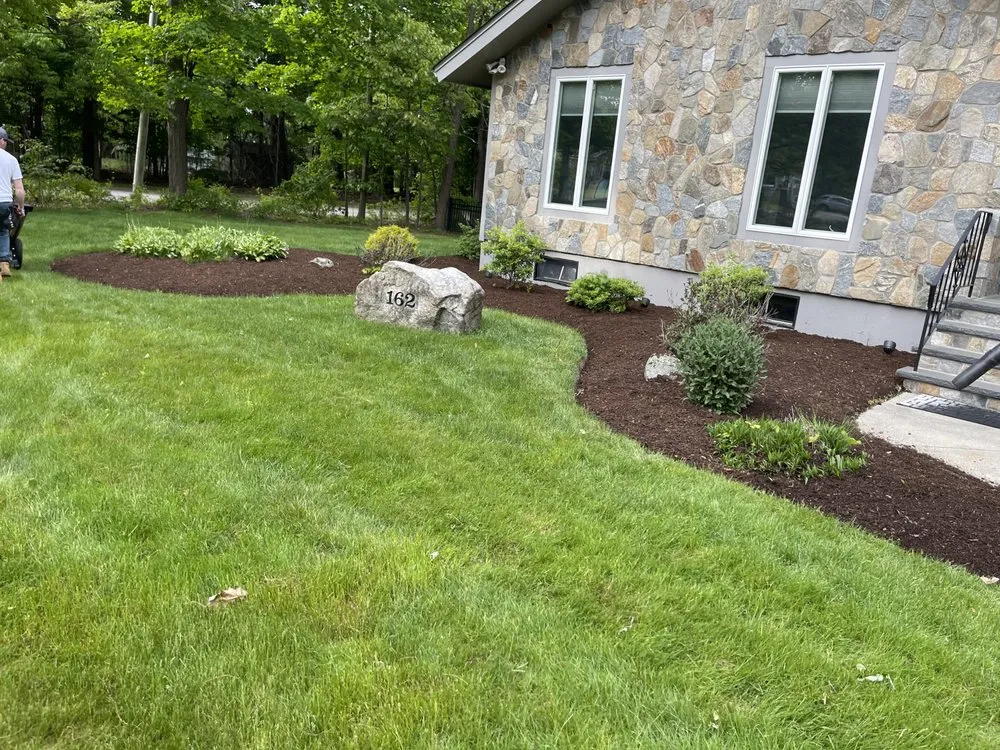 Local lawn care service with custom design across Middleborough, MA - We Landscape
