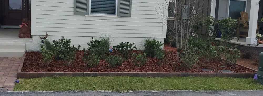 Affordable landscape design for homes in Panama City, FL by Webb's Land Management