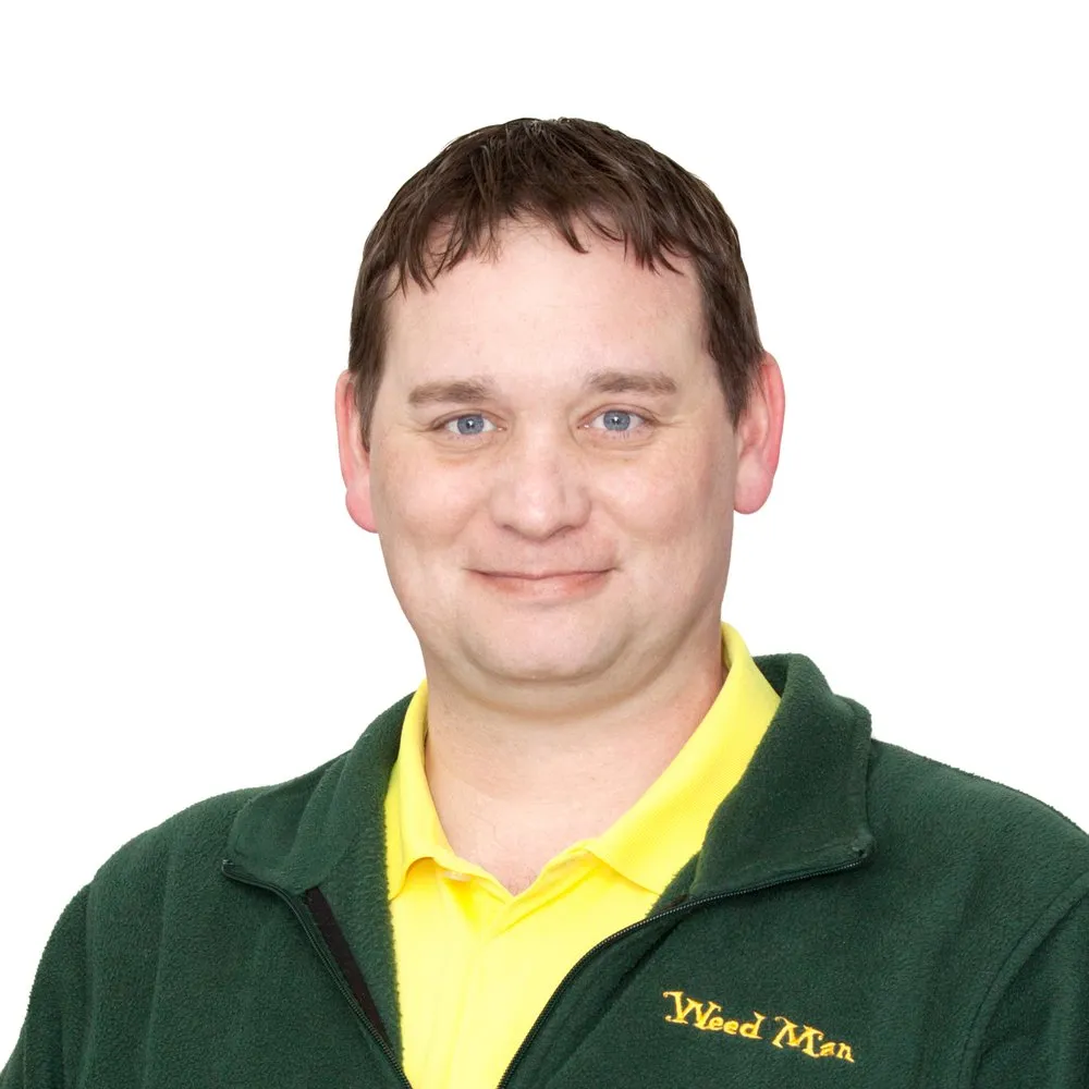 Custom landscape installation with custom design in Appleton, WI by Weed Man