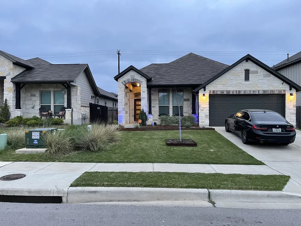 Professional landscape installation in Manor, TX by Weed Man