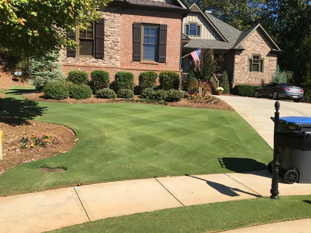 Custom landscape installation for year-round maintenance in Suwanee, GA by Weed Man