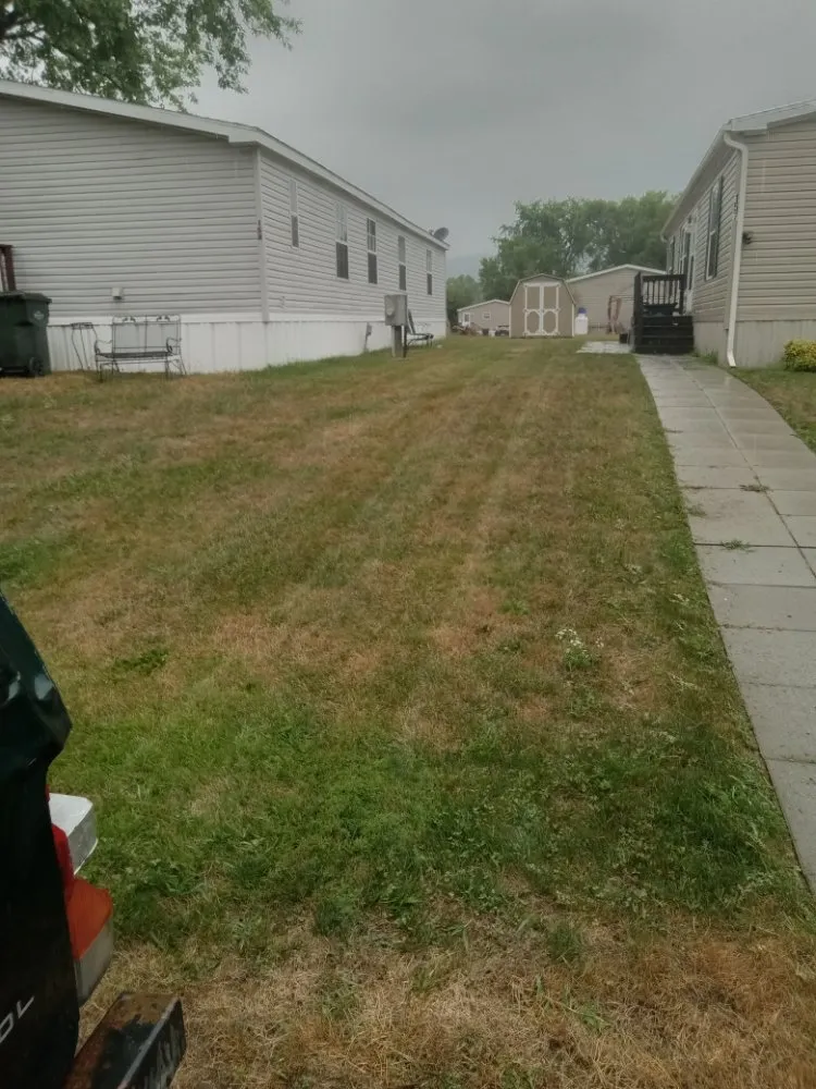 Professional lawn mowing service in Harrisburg, PA by Weedon and sons all seasons landscaping & more