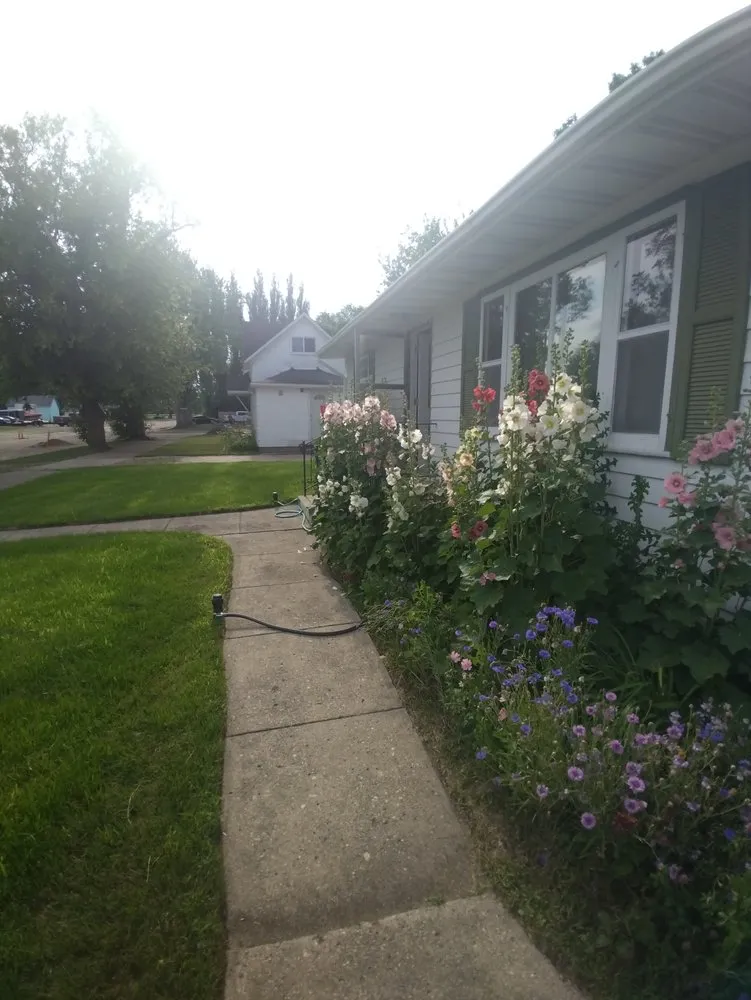 Affordable landscaping services for homes across GFAFB, ND - Weekend Warrior Lawn Care