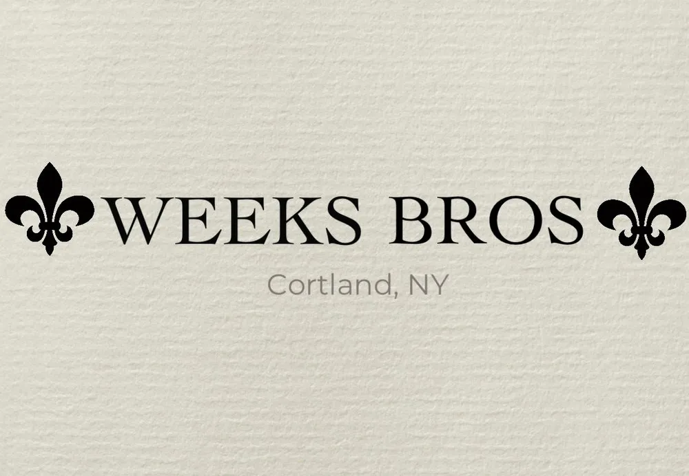 Custom landscape installation for year-round maintenance in Cortland, NY by Weeks Bros