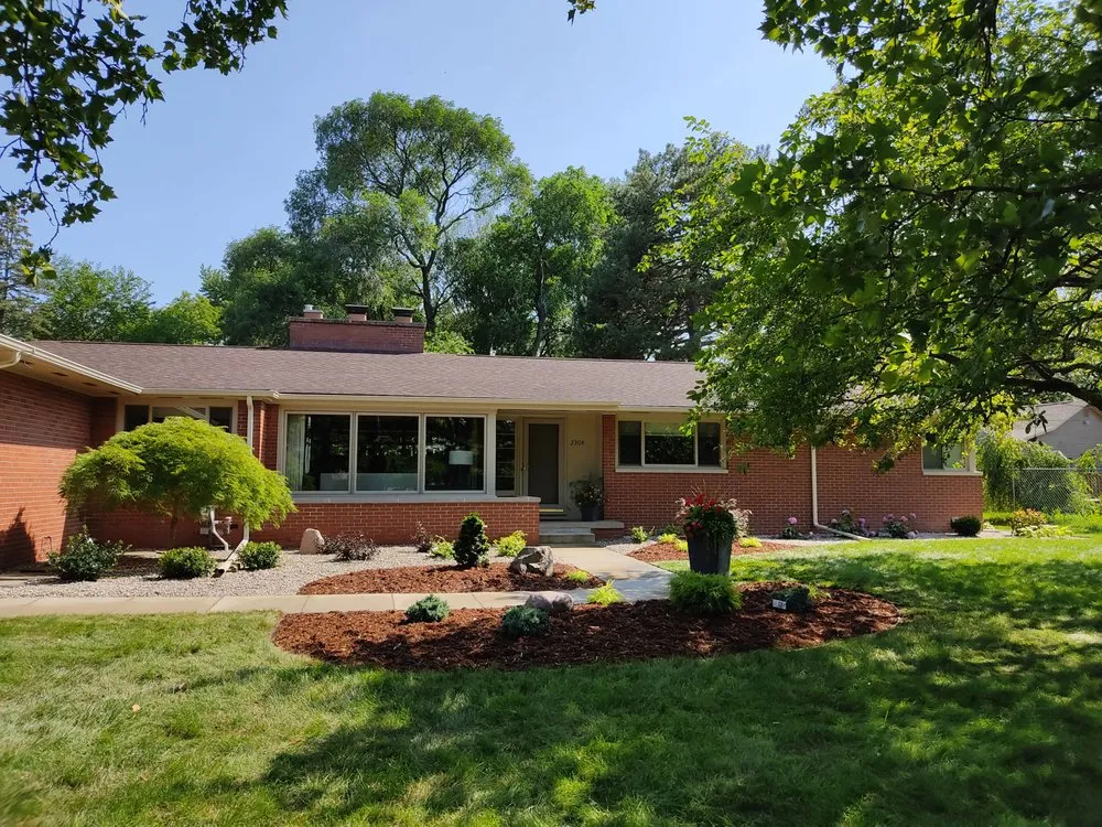 Custom lawn mowing service with custom design across Bay City, MI - Weiss Property Management