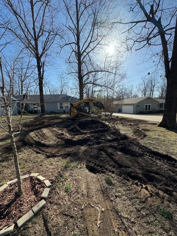 Custom lawn mowing service for outdoor upgrades in Mountain Home, AR by Wells Landscaping