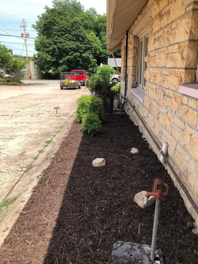 Custom landscape installation for year-round maintenance in Mountain Home, AR by Wells Landscaping