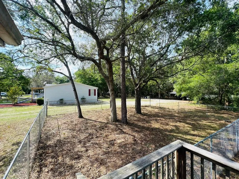 Custom outdoor landscaping for homes in Fernandina Beach, FL by Wells Lawn Maintenance