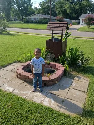 Wen Miller Landscaping and Complete Lawn Care Logo