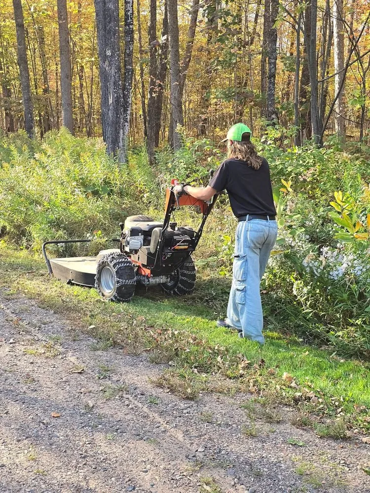 Expert lawn mowing service for year-round maintenance in Winter, WI by Wentzel's Yard Care