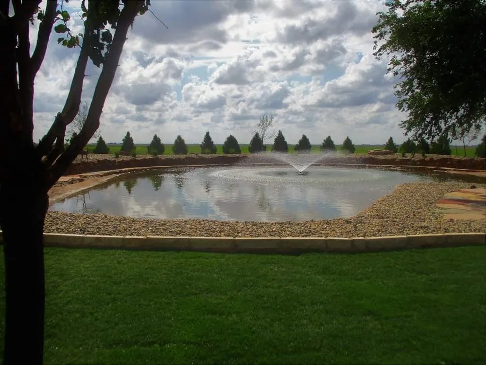 Professional lawn mowing service for residential properties in Levelland, TX by Wes' Landscape Care and Design