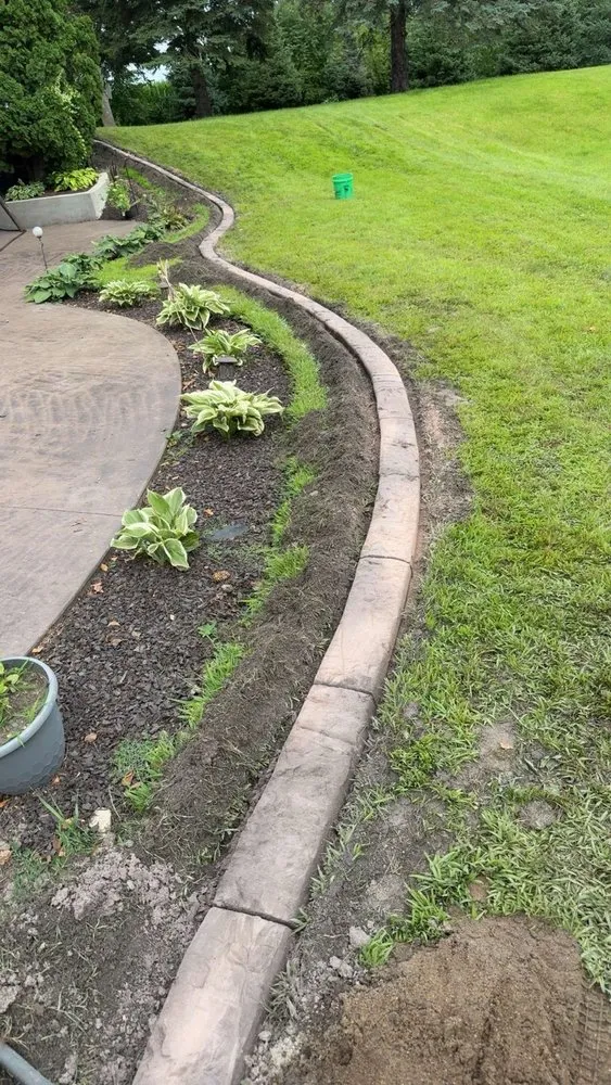 Reliable lawn mowing service for outdoor upgrades across Barrett, MN - West Central Decorative Curbing