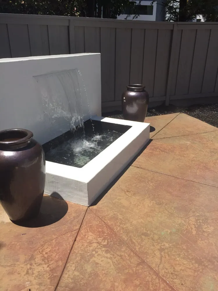 Affordable lawn mowing service with custom design in Vacaville, CA by West Coast Concrete Landscape & Pools