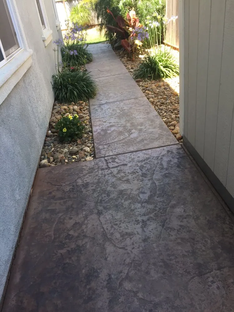 Affordable lawn mowing service for homes across Vacaville, CA - West Coast Concrete Landscape & Pools