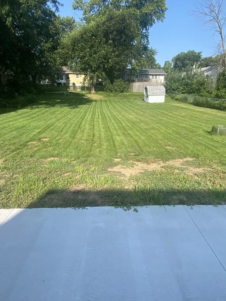 Professional lawn mowing service for year-round maintenance in Rock Island, IL by West Lawn Care