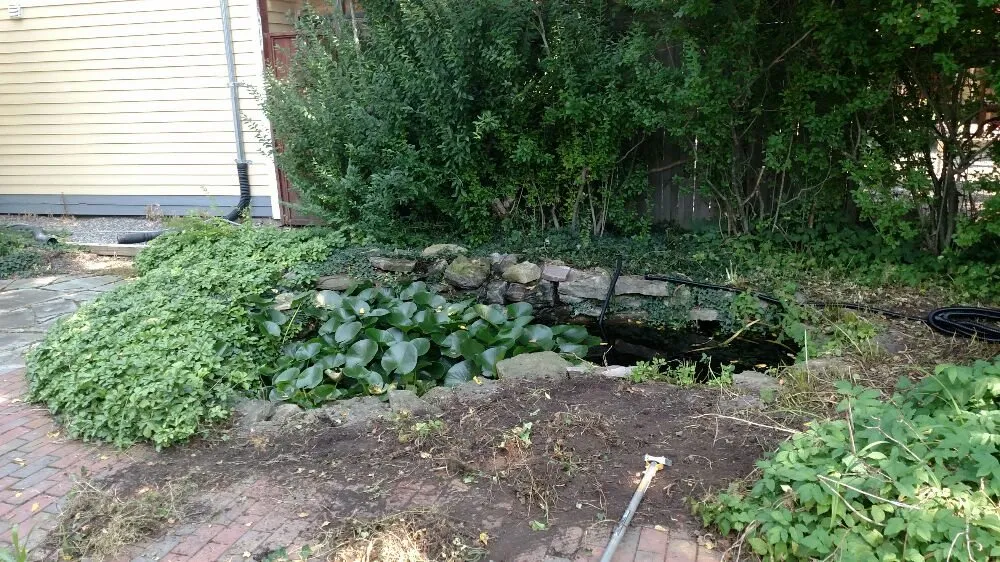 Trusted lawn mowing service for residential properties in Webster, NY by Westcott Improvements