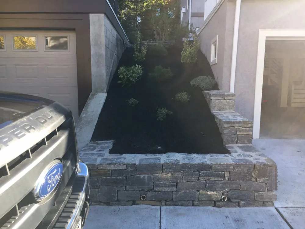 Professional lawn mowing service for residential properties in Hudson, MA by WF Landscape Services