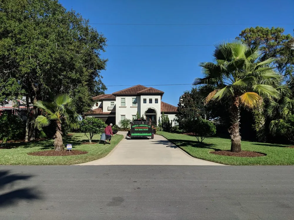 Local lawn mowing service for year-round maintenance in St. Augustine, FL by Whatley Landscapes