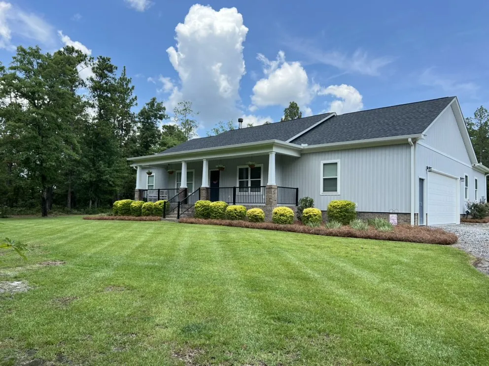 Professional outdoor landscaping for residential properties in Gilbert, SC by Whip’N Grass