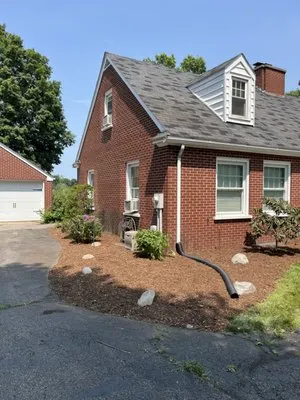 Whisman Lawn and Landscape Logo