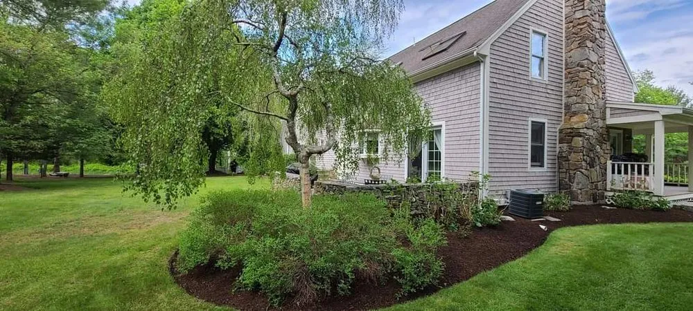 Custom yard cleanup service in Sagamore Beach, MA by White Cap Landscape