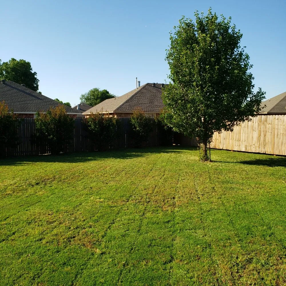 Custom garden landscaping in Mustang, OK by White Eagle Lawn Solutions and Trash Removal