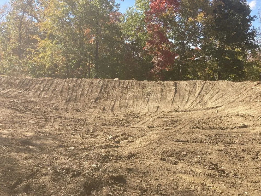 Reliable lawn mowing service in Fayetteville, AR by White River Dirtworks