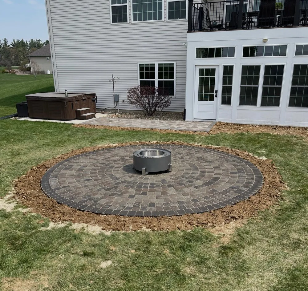 Top-rated lawn mowing service for year-round maintenance across Swisher, IA - Whitters Hardscapes