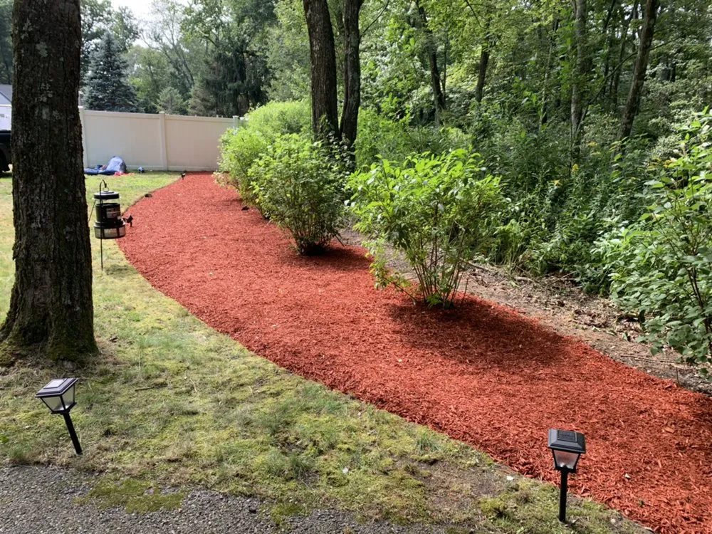 Trusted lawn mowing service with custom design in Attleboro, MA by Wicked Nice Lawn