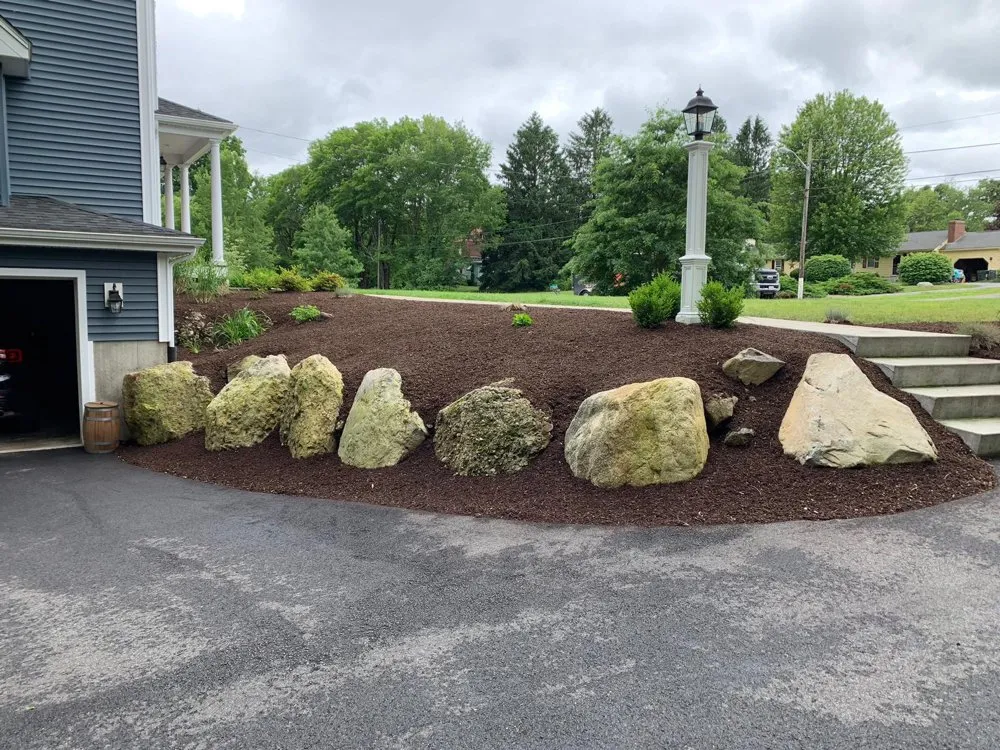 Custom yard cleanup service for year-round maintenance across Attleboro, MA - Wicked Nice Lawn