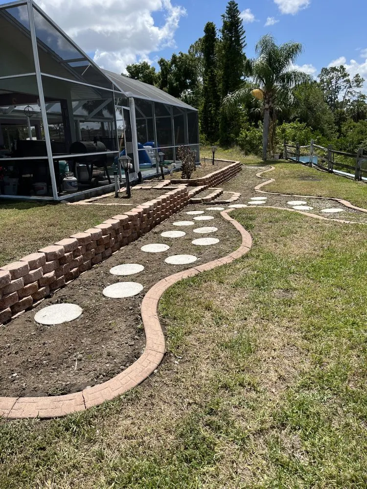 Local outdoor landscaping for residential properties in Port Charlotte, FL by Wicked Weed Wackaz