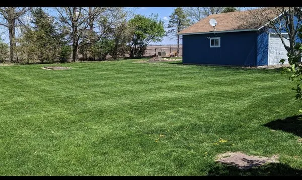 Wiekert Lawn Care Logo