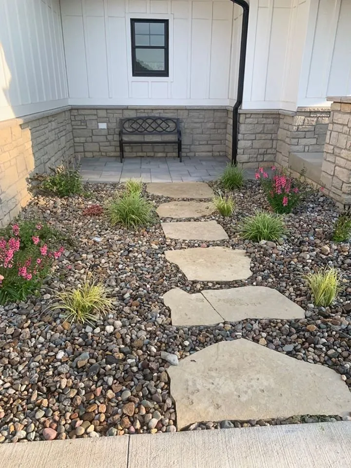 Reliable yard cleanup service for homes in Adel, IA by Wiges Outdoor Services