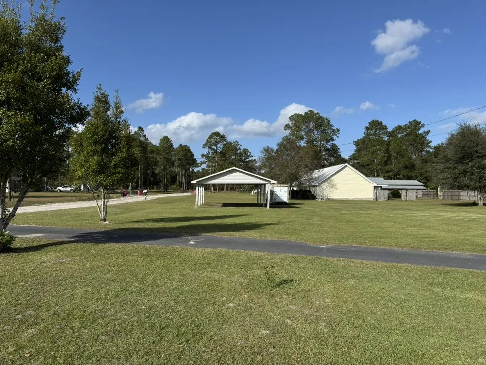 Professional lawn care service for residential properties in Jesup, GA by Wilder Roots