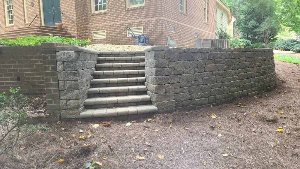 Expert lawn mowing service in Williamsburg, VA by Wiliiamsburg Retaining Construction Landscaping