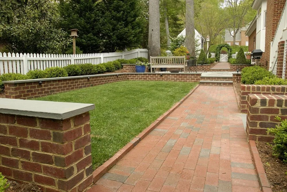 Custom yard cleanup service for year-round maintenance in Williamsburg, VA by Williams Landscape & Design